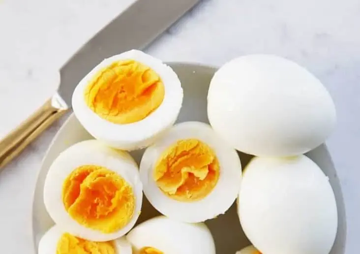 Hard-boiled eggs on a plate.