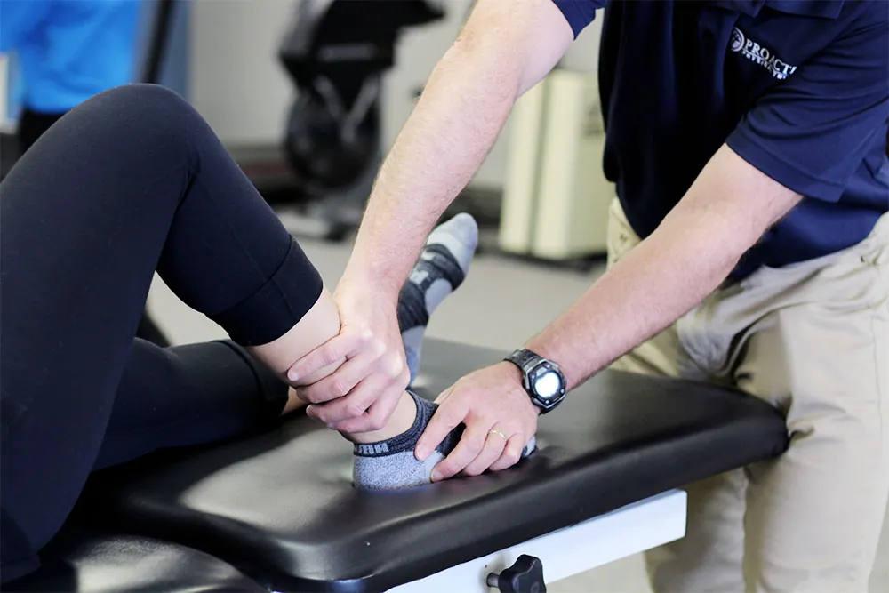 PT, treating ankle injury.