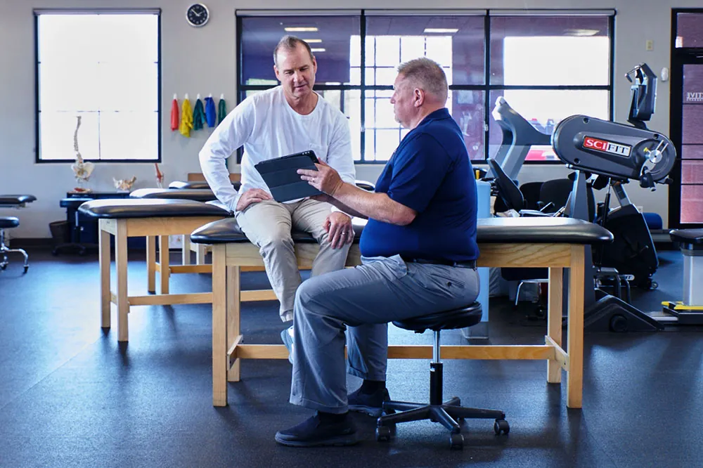 PT, Jason explaining process to client.