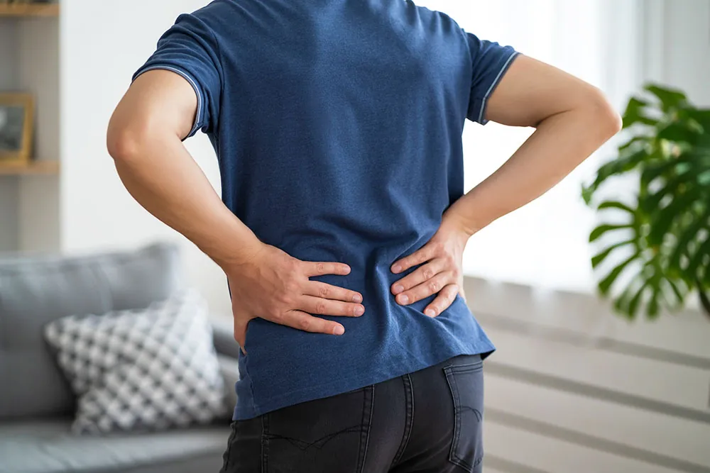 Man suffering lower back pain.