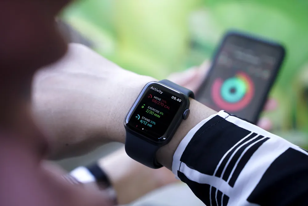 person checking apple watch