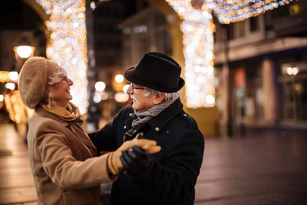 Couple dancing for the holidays and no stress.